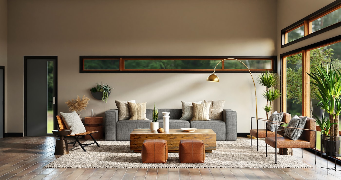 Bright modern living room with neutral furniture, natural light and indoor plants